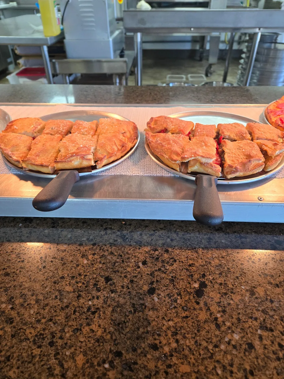 Calzones photographed for Gulf Coast Pizza’s official website; not an item-specific serving guarantee
